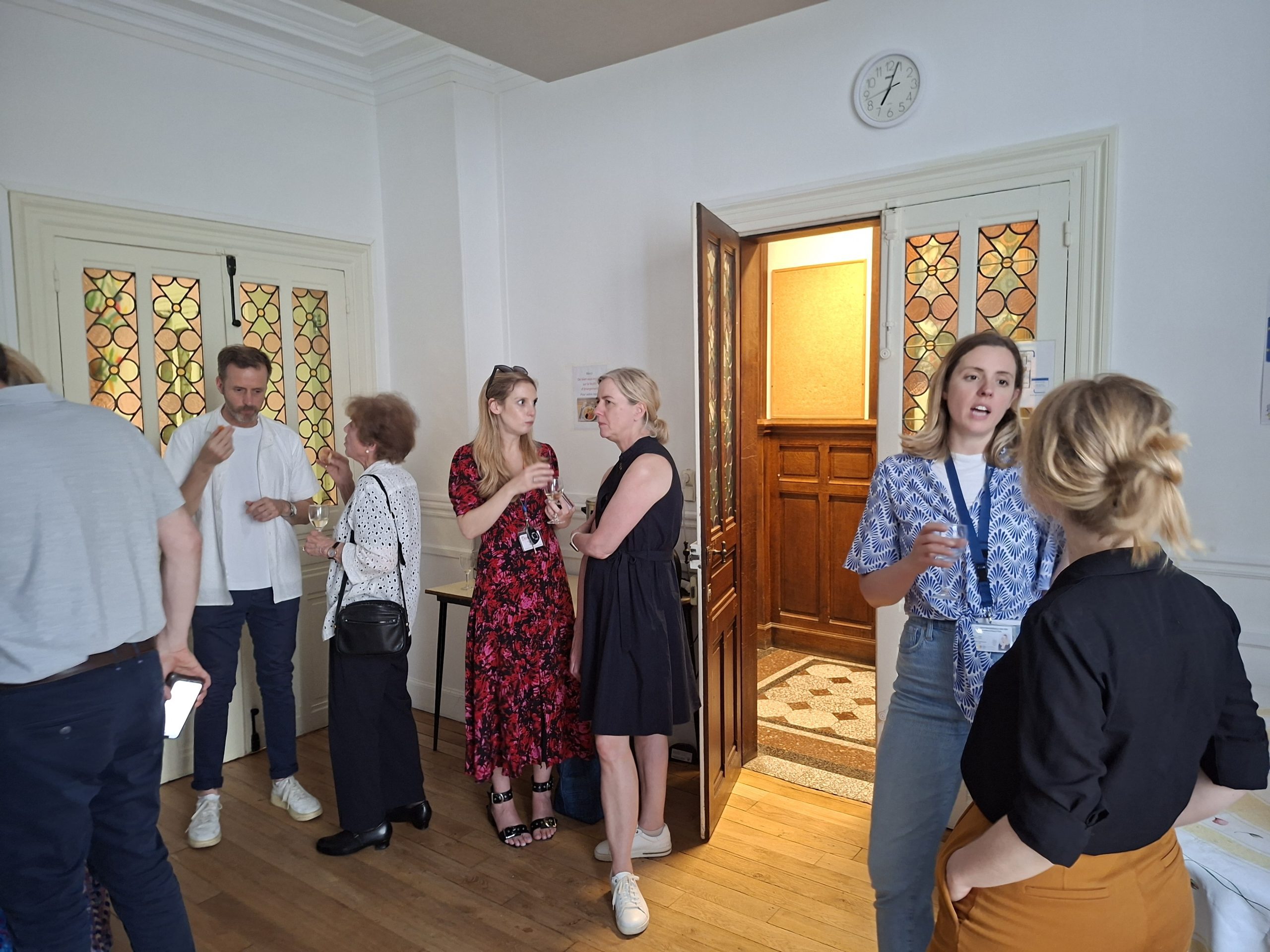 ELSA volunteers mingling at an indoor event