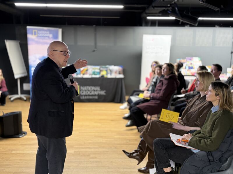 Pie Corbett presenting in front of a group of educators